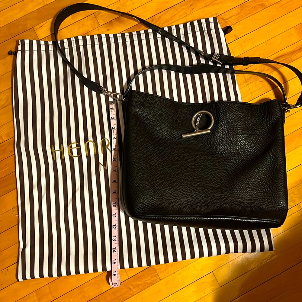 Henri Bendel beautiful black leather bag w/dust bag.  Like new, barely used!
